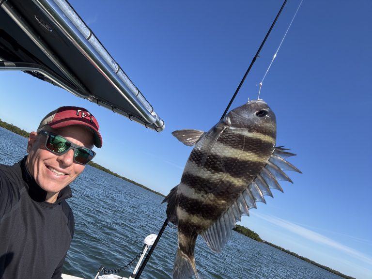 Darren Klugman with a Freshly Caught Fish